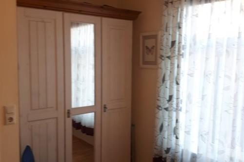 Borkum Ferienwohnung Villa Central - Fewo Nr. 3 - Wilhelm-Bakker-Str.28 - Kiebitznest - Schlafzimmer - Doppelbett 200*180cm, usw