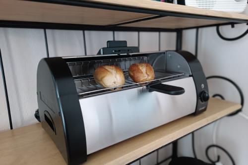 Borkum Ferienwohnung Villa Harmonie - Apartment Veilchen - Brötchenofen