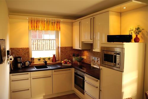 Borkum Ferienhaus Dünenhaus Borkum - 13 (vorne) - Küche