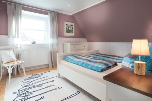 Borkum Ferienhaus et Lootsje - Schlafzimmer 1