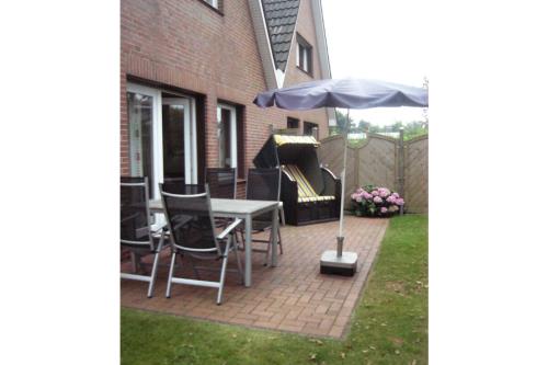 Borkum Ferienhaus Ferienhäuser Herrlich - Herrlich 29 - terrasse mit strandkorb
