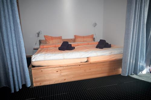 Borkum Ferienwohnung Dr. Alex - Bett