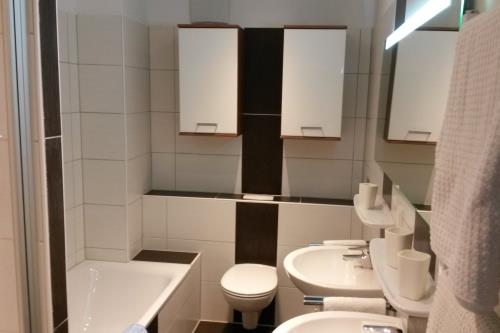 Borkum Holiday 3-Zimmer-Ferienwohnung - Holiday 3 Zimmer - Bad 1