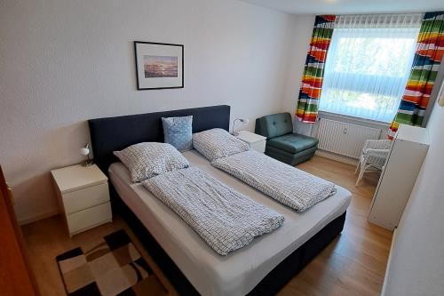 Borkum Holiday 3-Zimmer-Ferienwohnung - Holiday 3 Zimmer - Schlafzimmer01