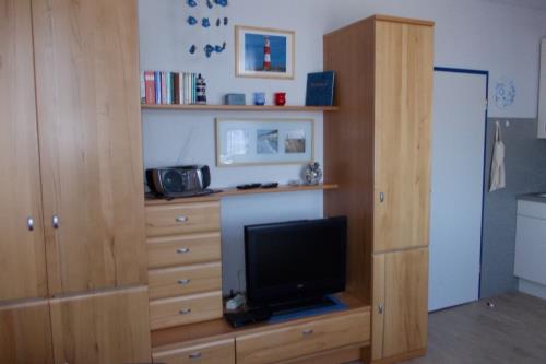 Borkum Ferienwohnung Oskar - Wohnwand