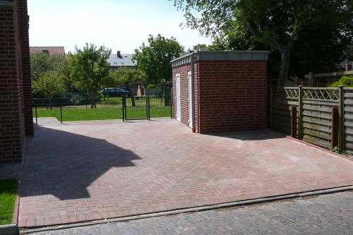 Borkum Ferienwohnung Sternenblick Borkum - Parkplatz u. Fahrradraum (Lademöglichk.)