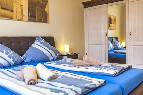 Borkum Ferienwohnung Swantje / Haus Leuchtturmkieker - Schlafzimmer 1