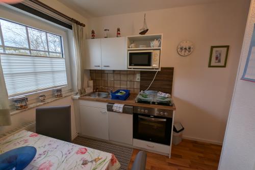 Borkum Haus Ites - Ferienwohnungen Anker und Möwe - PXL 20250409 063129940