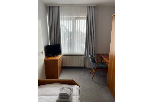 Borkum Hotel Haus Passat - Einzelzimmer 05 EG - 05 EG - Einzelbett