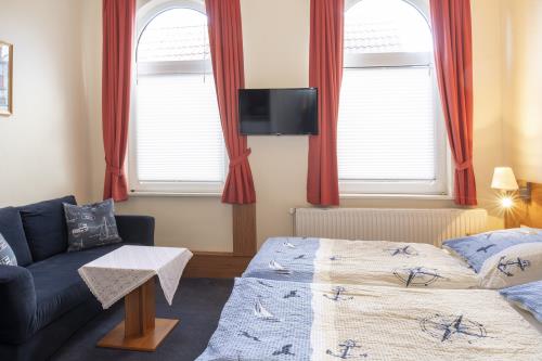 Langeoog Ferienwohnung Appartementhaus Alte Post - 17 - App 17 Schlafbereich