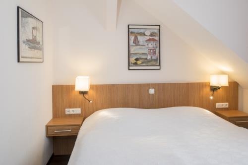 Langeoog Ferienwohnung Appartementhaus Alte Post - 22 - App 22 Bett