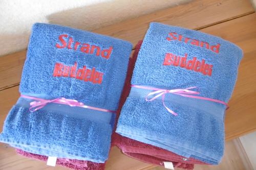 Langeoog Ferienwohnung Appartementhaus Buddelei  - 8/108 - Strand und Erlebnisbad Handtücher