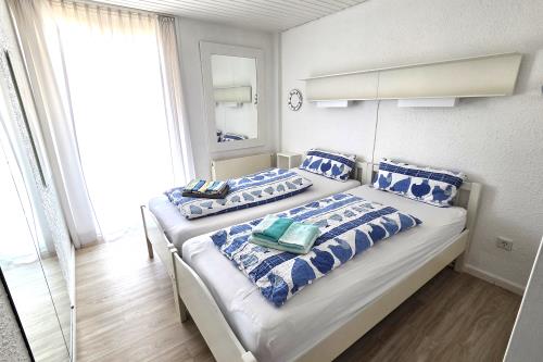 Langeoog Ferienhaus Us Langeoog - Blaue Dören - Schlafzimmer 1