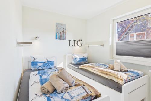 Langeoog Dat oll Beerkutscherhuus - Ferienwohnung Dünengras - Ausstattung 12