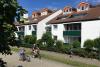 Langeoog Ferienwohnung FeWo Kurth - Außenansicht mit Enkelkindern (1. OG)