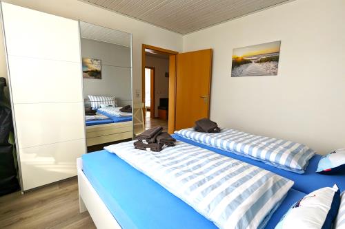 Langeoog Ferienwohnung Ferienhaus Katja und Ralf Heimes - 1 - Schlafraum