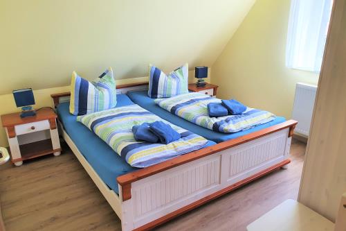 Langeoog Ferienwohnung Ferienhaus Katja und Ralf Heimes - 2 - Schlafen OG