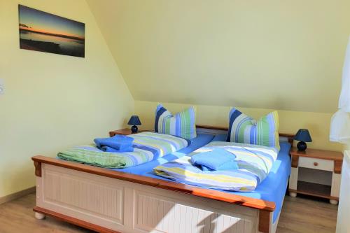 Langeoog Ferienwohnung Ferienhaus Katja und Ralf Heimes - 2 - Schlafen Eltern DG