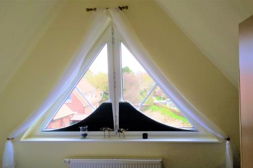 Langeoog Ferienwohnung Ferienhaus Katja und Ralf Heimes - 2 - Schlafen Eltern DG