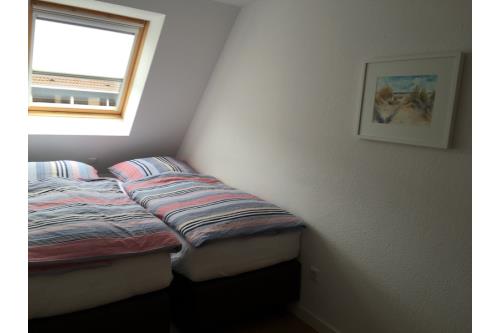 Langeoog Ferienhaus MeerZeit - MeerZeit - Schlafzimmer (2 von 3)
