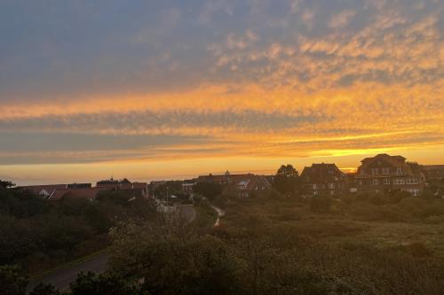 Langeoog Ferienwohnung Oog Blick - Ausblick vom Balkon über den Hospizplatz