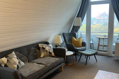 Langeoog Ferienwohnung Oog Blick - App.8 - Wohnzimmer Bild 2