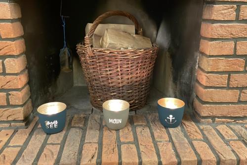 Langeoog Ferienwohnung Oog Blick - App.8 - Kamin im Wohnzimmer