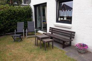 Ferienwohnung Lütje Oog (links)