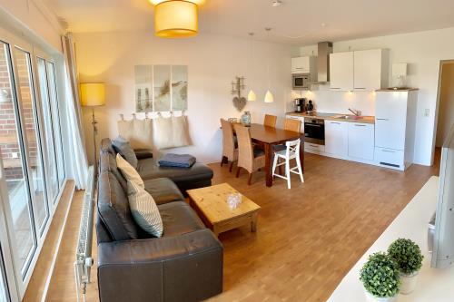 Langeoog Ferienwohnungen Fritz-Reuter-Straße - Parterre - Wohnzimmer