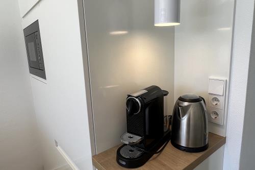 Langeoog Ferienwohnungen Kiebitzweg - N8koje - Nespressomaschine & Wasserkocher