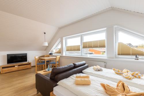 Langeoog Ferienwohnungen Müller - App. 5 - Wohnen, Essen, Schlafen