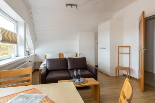 Langeoog Ferienwohnungen Müller - App. 5 - Wohnen, Schlafen