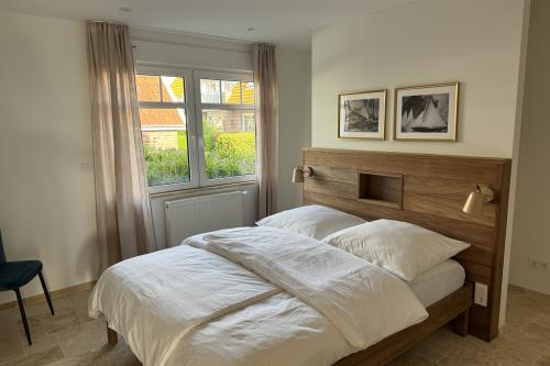 Langeoog Ferienwohnung Polderhus - 1 - Schlafzimmer 2