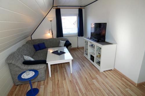 Langeoog Ferienwohnung Achter&#39;t Dörp - 3 - Wohnzimmerbereich i.d.Wohnküche