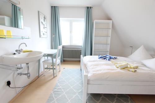 Langeoog Ferienwohnung Us Langeoog - Haus Bodman - OG - Ausstattung 6