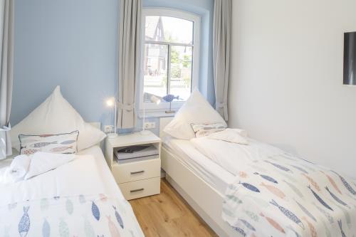 Langeoog Ferienwohnung Haus Dünenlust - Heringsmöwe - Schlafzimmer 1