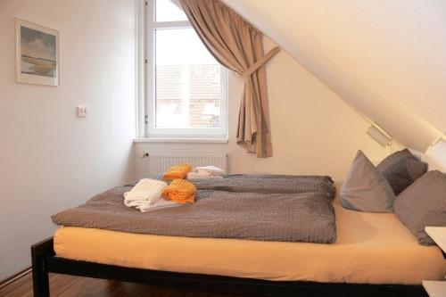 Langeoog Ferienwohnung Haus Kettelhack - K F - Schlafzimmer