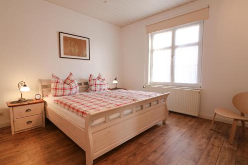 Langeoog Ferienwohnung Vermietung am Meer – Haus Killewipps - Killewipps EG - Schlafzimmer