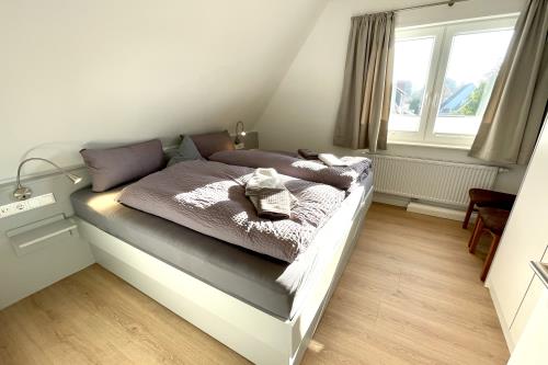 Langeoog Ferienwohnung Haus Otten - Otten 2 - Schlafzimmer1