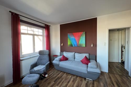 Langeoog Ferienwohnung Haus Apollonia - Wohnung 3 - Schlafsofa im Wohnzimmer