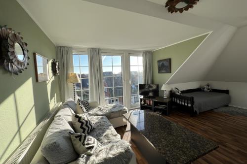 Langeoog Ferienwohnung Haus Apollonia - Wohnung 5 - W 5 Wohnzimmer mit zusätzlichem Einzelbe