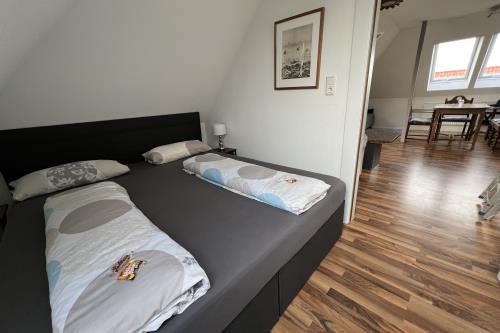 Langeoog Ferienwohnung Haus Apollonia - Wohnung 5 - W5 Schlafzimmer mit Doppelbrett