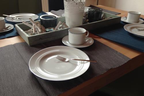 Langeoog Ferienwohnung Haus Dünenrose-Sanddornweg - Dünenrose1 - Hochwertiges Friesland Geschirr