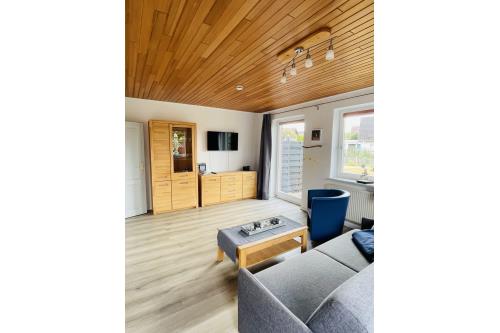 Langeoog Ferienwohnung Haus Dünenrose-Sanddornweg - Dünenrose1 - Wohnen 1