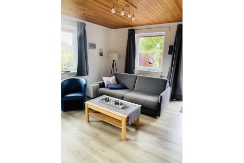 Langeoog Ferienwohnung Haus Dünenrose-Sanddornweg - Dünenrose1 - Sofa 1
