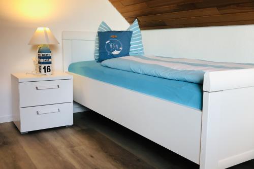 Langeoog Ferienwohnung Haus Dünenrose-Sanddornweg - Dünenrose2 - Schlafzimmer