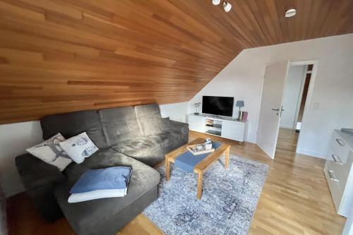 Langeoog Ferienwohnung Haus Dünenrose-Sanddornweg - Dünenrose3 - Wohnzimmer