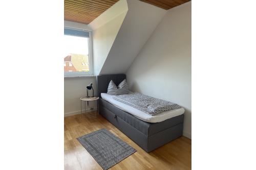 Langeoog Ferienwohnung Haus Dünenrose-Sanddornweg - Dünenrose3 - Schlaf mit Einzelbett 