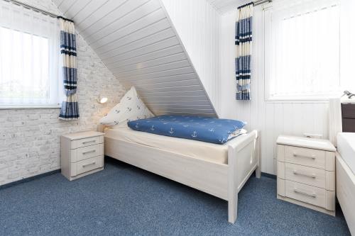 Langeoog Ferienwohnung Haus Strandboje und Haus Dünenrose - Dünenperle - Schlafzimmer 1