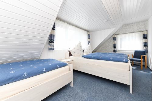 Langeoog Ferienwohnung Haus Strandboje und Haus Dünenrose - Dünenperle - Schlafzimmer 1